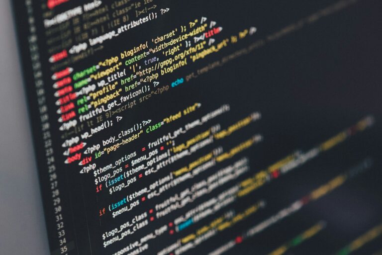 Lines of program code on a dark computer screen