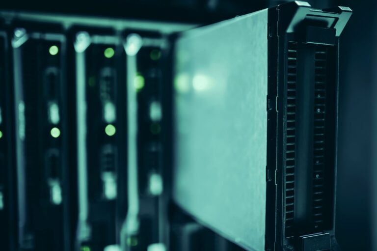 Server racks in a data center with glowing lights