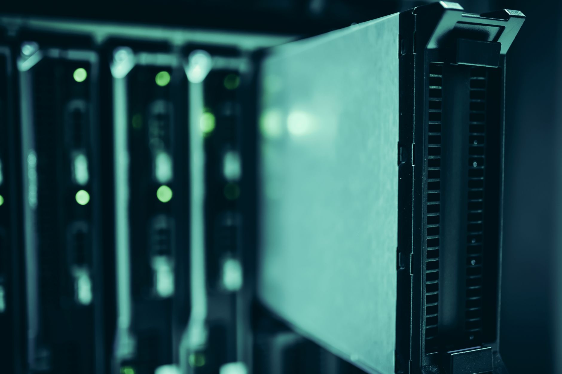 Server racks in a data center with glowing lights